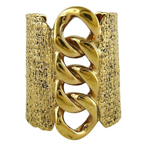 ysl gold cuff|YSL matching bracelets.